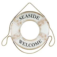 Life rescue ring with seaside welcome printed on it.